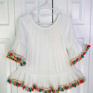 Ethnic blouse with pompoms